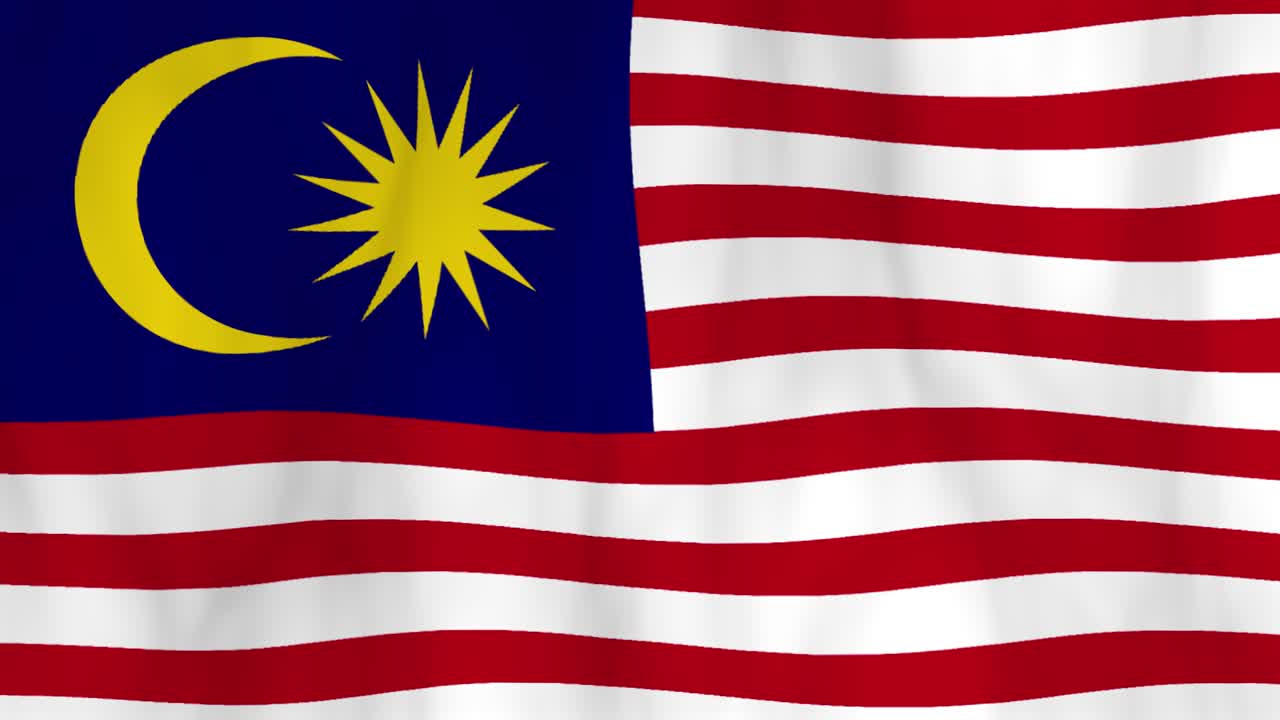La bandiera della Malesia sventolata nel vento