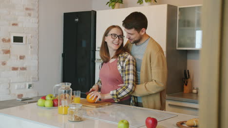 couple preparing breakfast together