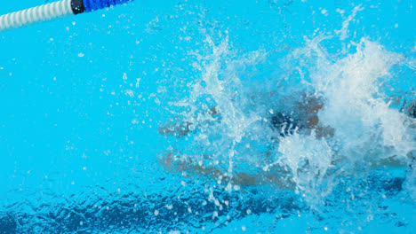 young male swimmer swimming inside pool 4k