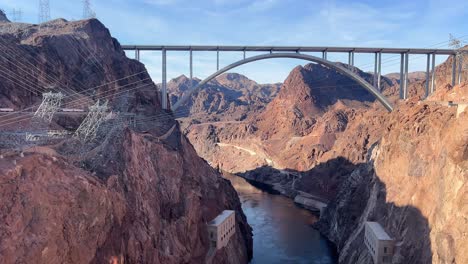 a picturesque scene beautifully showcasing the magnificent hoover dam along with its impressive a picturesque scene beautifully showcasing the magnificent hoover dam along with its impressive bridge nearby