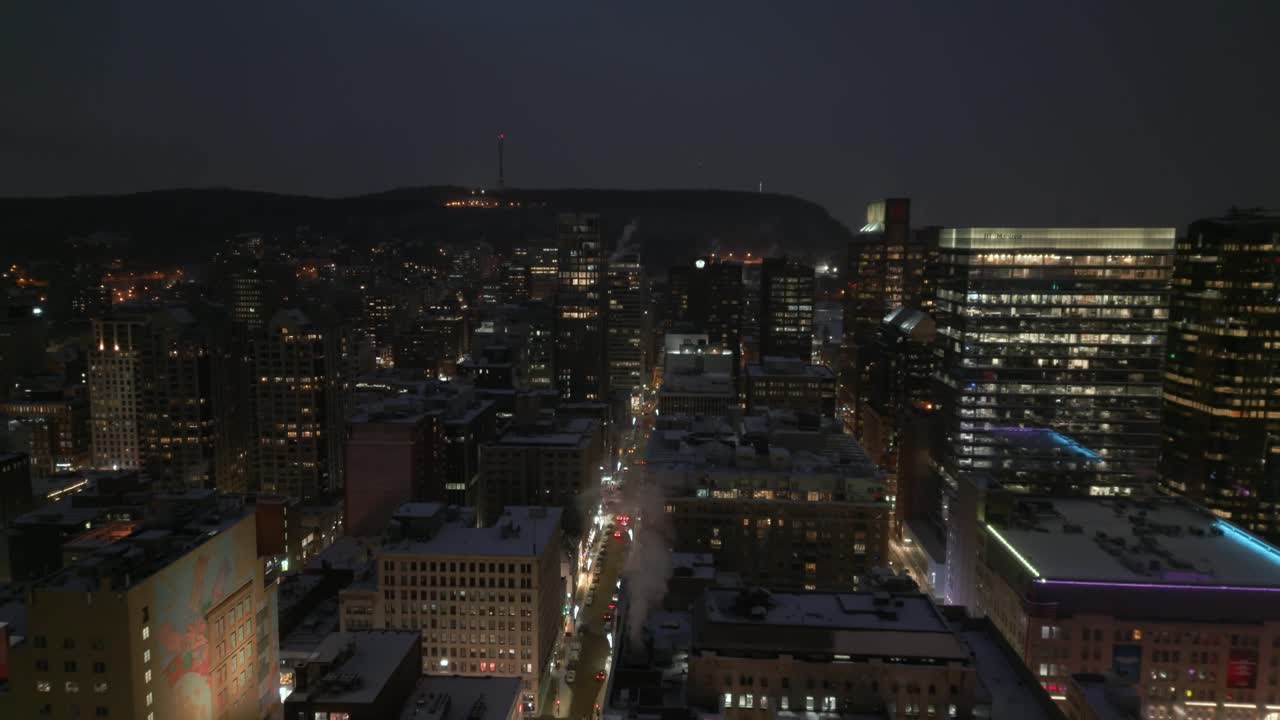 Aerial View of Illuminated Skyscrapers in Montreal Downtown at Night
