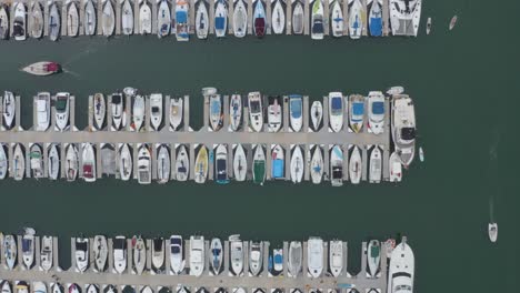 a beautiful aerial birds-eye view drone shot, flying over the dana point harbor, dana point - orange county - california