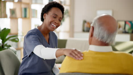 caregiver assisting elderly patient at home