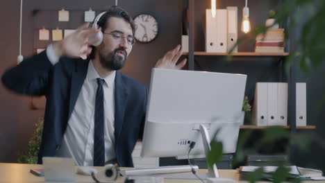 businessman dancing during video call