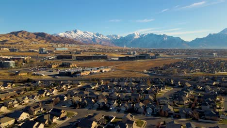 view of silicon slopes in lehi and highland utah - aerial view on an idyllic community beneath snow-capped mountains