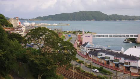 Toba-City-and-Ise-Bay-Establishing-Shot,-Slow-Motion-Pan-of-Japan-Town