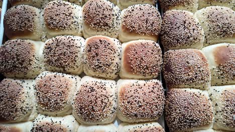 freshly baked sesame seed rolls