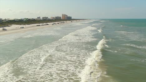 a lowering aerial wide shot view of new smyrna beach, florida