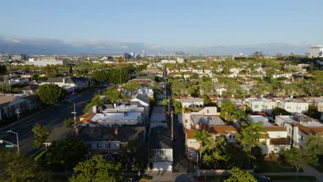 Drone-shot-low-over-wealthy-neighborhood-in-Beverly-Hills,-golden-hour-in-Los-Angeles,-USA