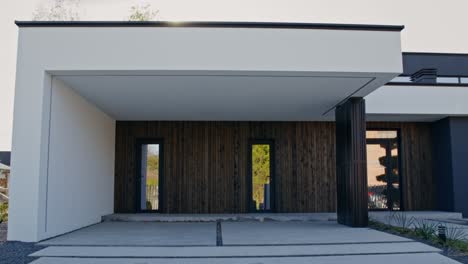 modern house exterior with dark wood accents