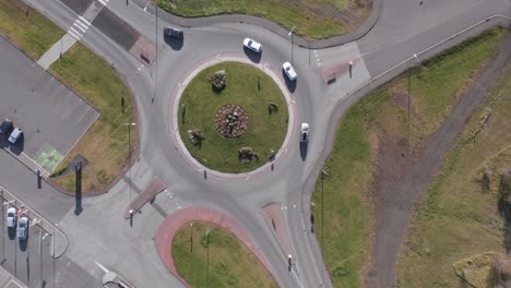 roundabout on sunny day in hella, iceland, top down