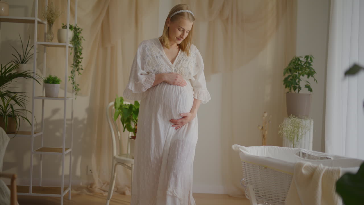 Pregnant Woman Preparing for Birth in Decorated Room