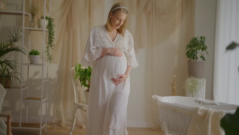 pregnant woman preparing for birth in decorated room