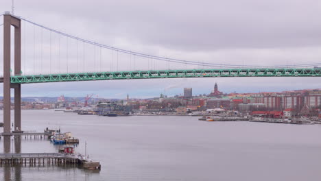 Aerial-trucking-shot-reveals-prominent-Älvsborg-suspension-bridge-in-Gothenburg