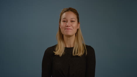 Woman-Laughs-to-Camera