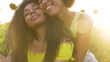 women in a sunflower field