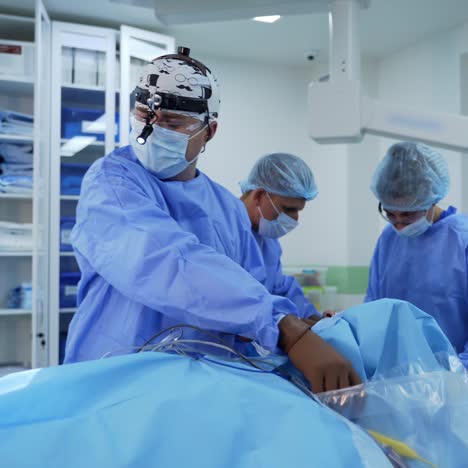 team surgeon at work in operating room. modern equipment in operating room
