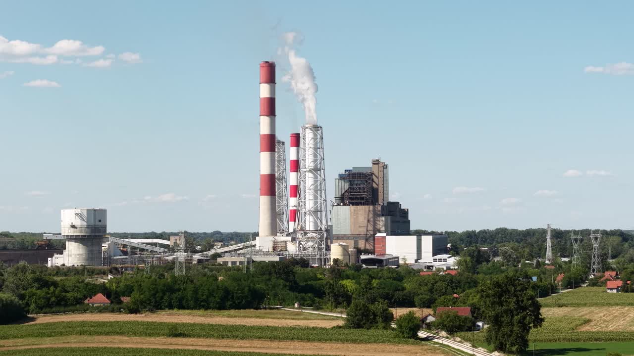 Drone Shot Of Energy Plant With Coal Power Infrastructure, Plain Landscape