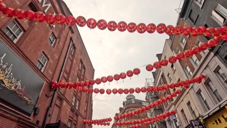 red lanterns strung between buildings