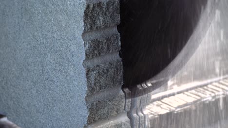 cutting granite slab by a circular saw.