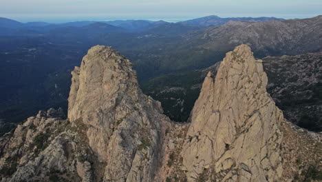 two large rocks perched on corsica mountain top