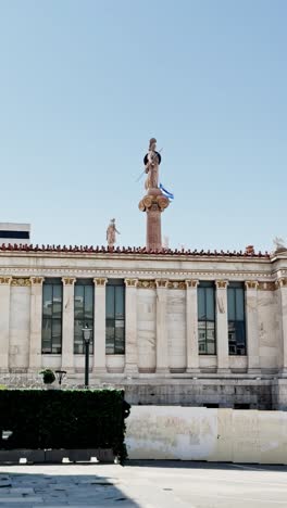 modern cityscape meeting classical heritage in athens university area