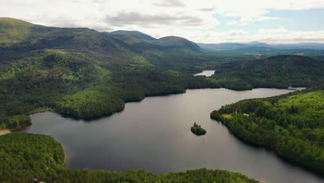 Cairngorms-Crown:-The-Aerial-Majesty-of-Loch-An-Eilein-Amidst-the-Scottish-Highlands,-Aviemore,-Scotland