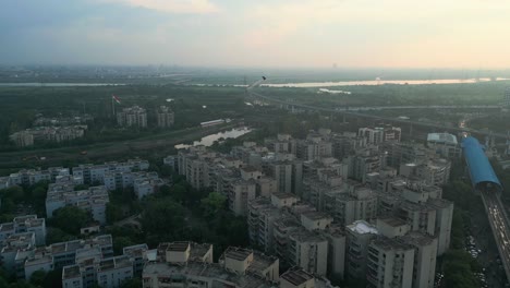 kite flying on buildings in noida drone moving closer to kite delhi in india