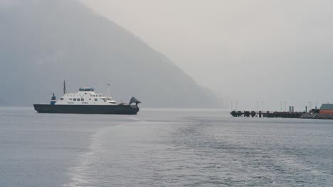 a passenger ferry arriving at the terminal