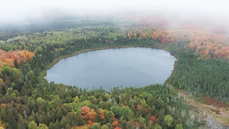 aerial flying over lake oberg in minnesota on an overcast day