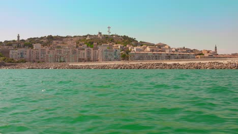 scenic coastal view of sète, france with tranquil sea and clear sky
