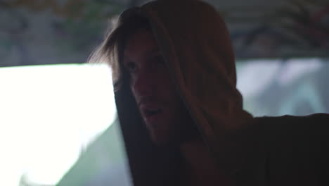 close up of young man boxing in an underpass