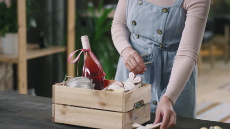 Woman Preparing Easter Gift Basket
