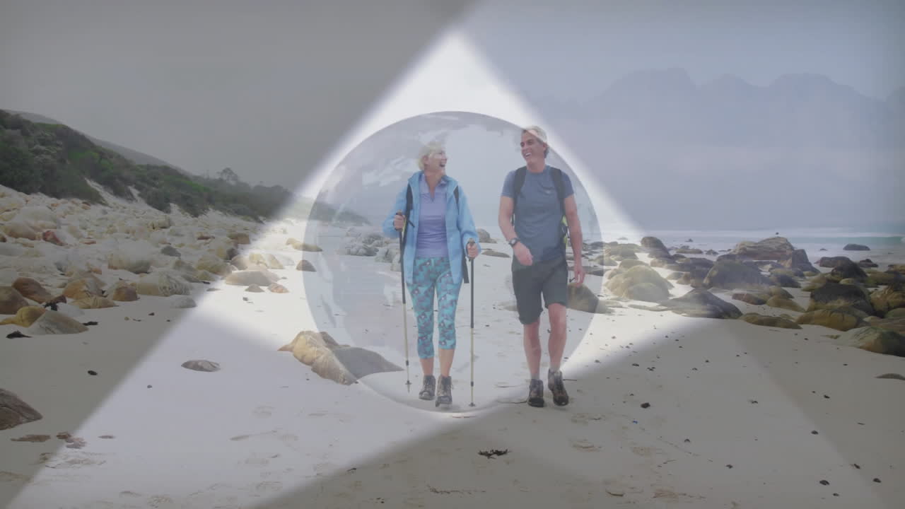 Senior couple walking shore with backpacks for travel marketing, displaying animated map overlay