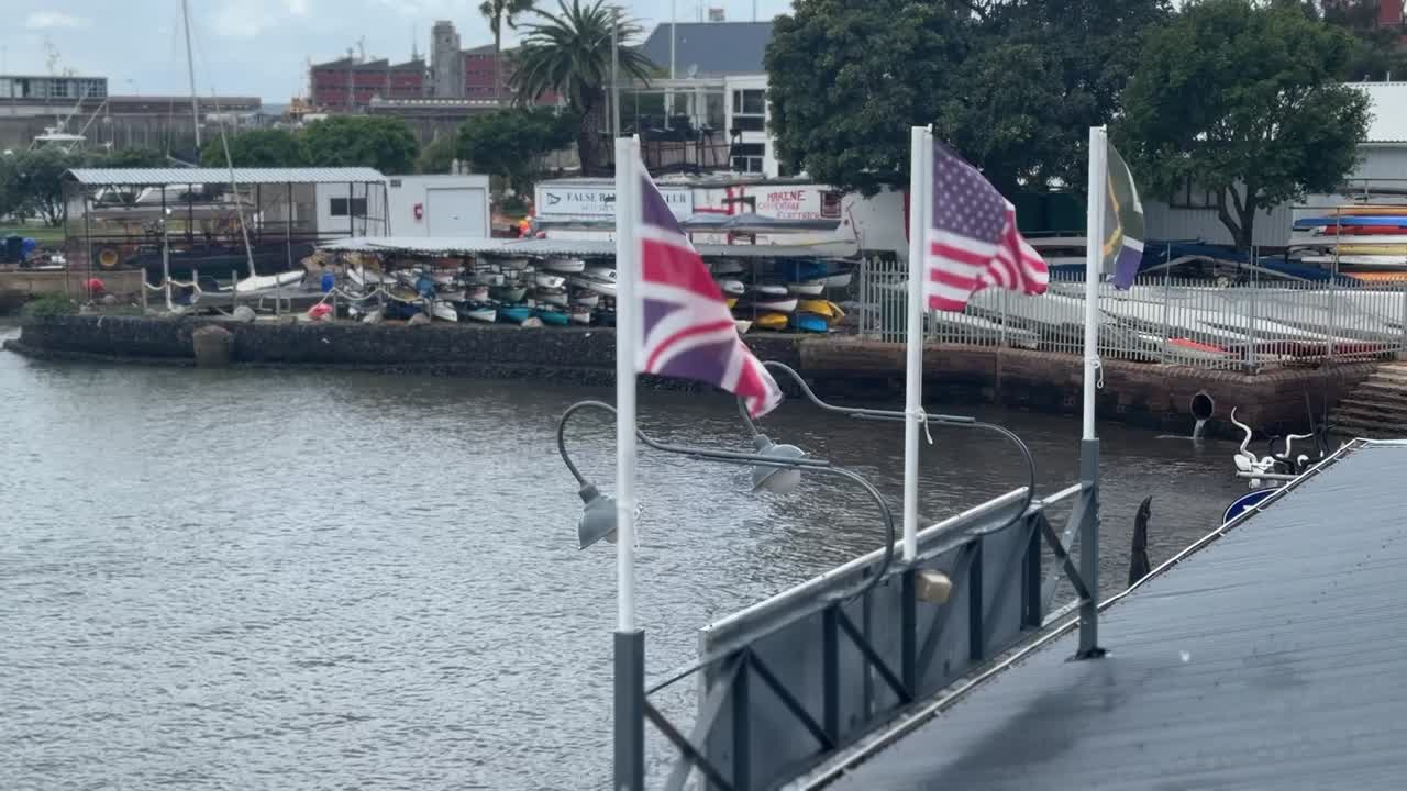 Row of Flags at a harbour at Simon’s Town near Cape Town.