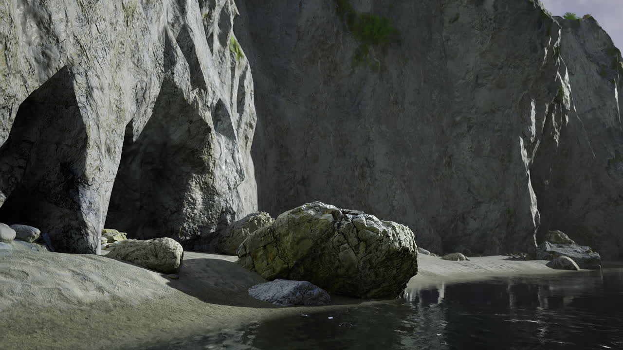 Rocky coastline with clear water along a serene beach at sunset