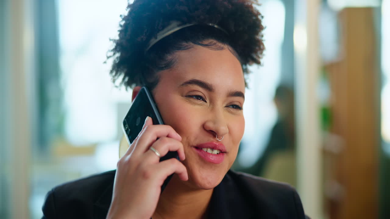 Businesswoman talking on the phone in the office