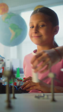 children working on a science project