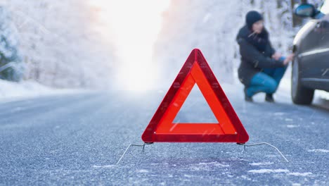 winter driving cinemagraph - car breakdown on a mountain road