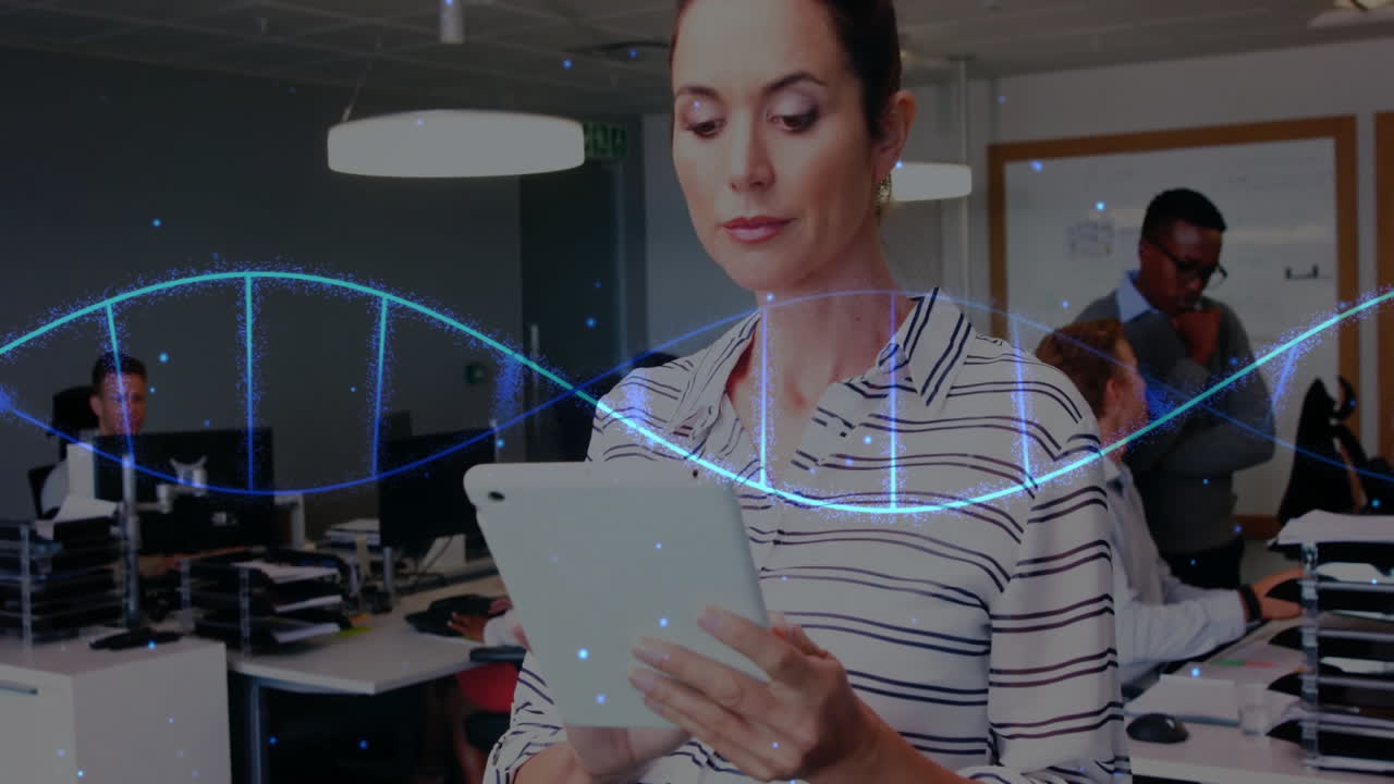 DNA strand animation over woman using tablet in modern office