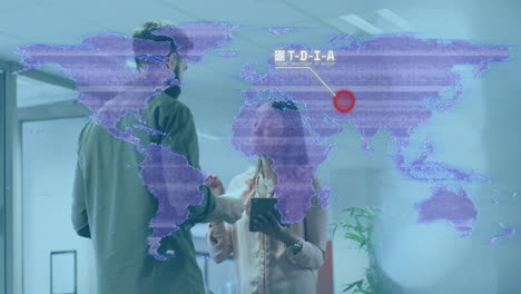 Discussing with digital world map overlay, business professionals analyzing data points
