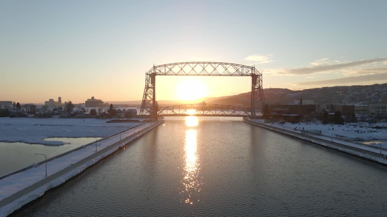 Canal Park bridge boarder between Duluth Minnesota and Superior Wisconsin, winter sunset