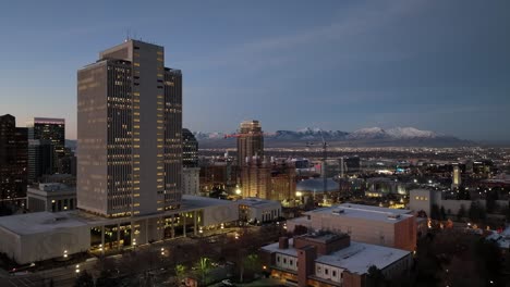 Central-Salt-Lake-City,-Utah-and-Temple-Square-at-dawn---aerial-flyover