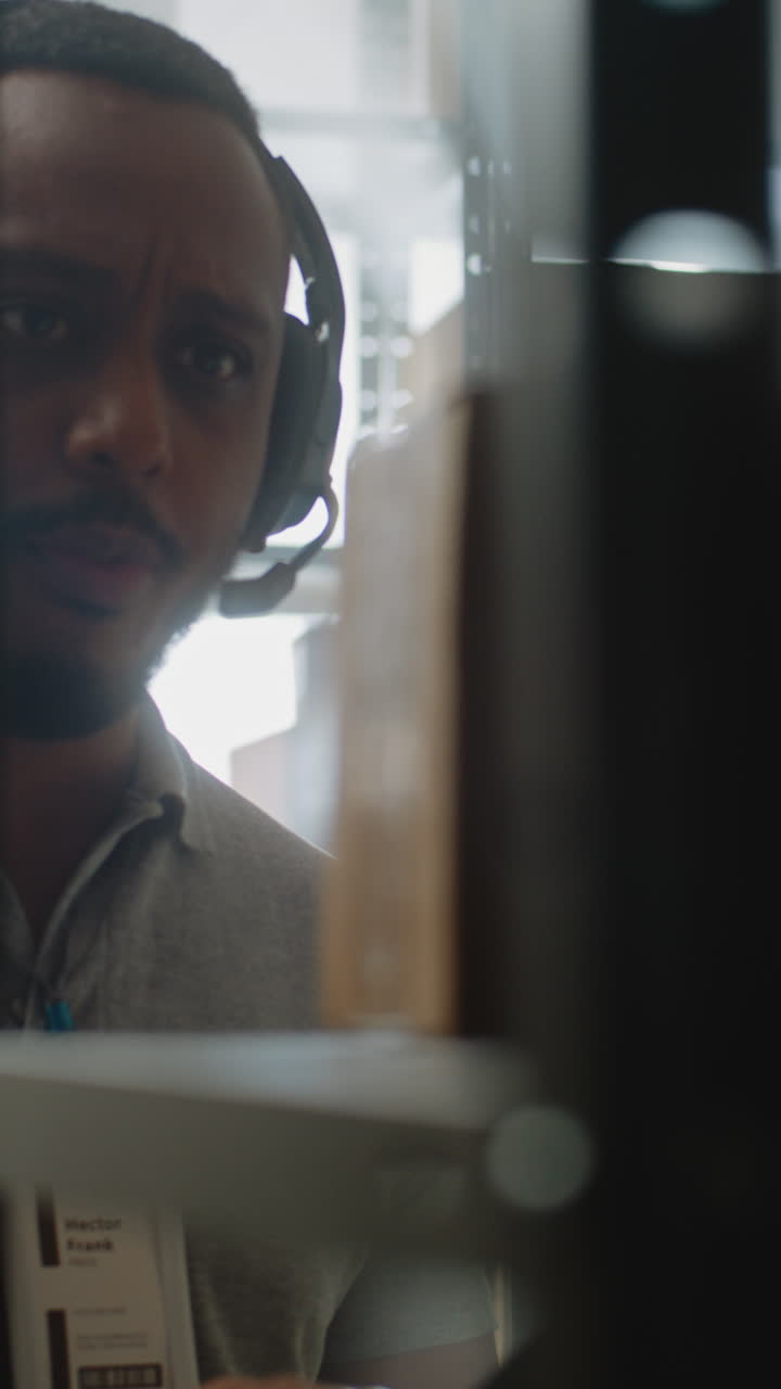 Man with Headset in Office
