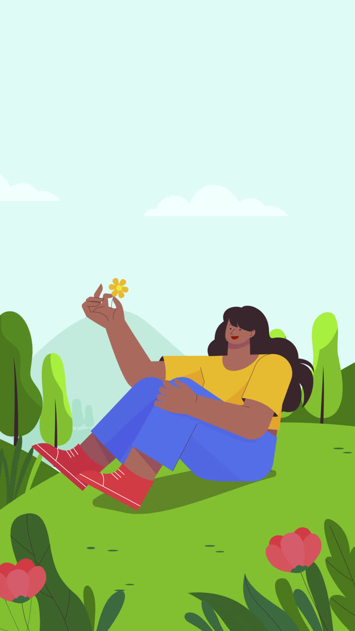 Woman enjoying a flower in nature