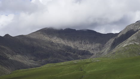 time-lapsed clouds over mountain on isle of skye 4k