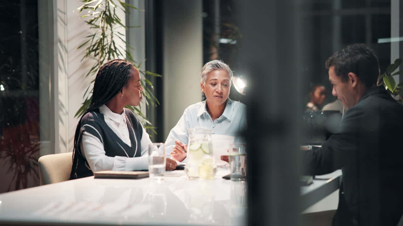 Team discussing business strategy in a modern office