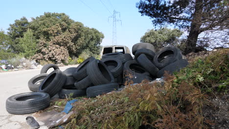 big pile of tires illegal garbage dump. environmental pollution aix en provence