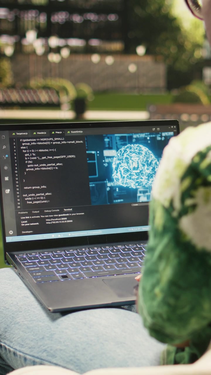 Vertical Video Woman student using binary code and artificial intelligence on laptop