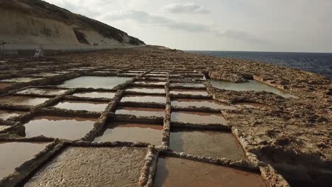 aerial view of the salt pans at xwejni bay, gozo, malta